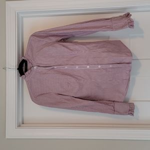 The limited striped ruffled blouse